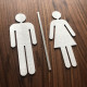 Pictogramme homme + femme + barre centrale toilettes 10/15cm